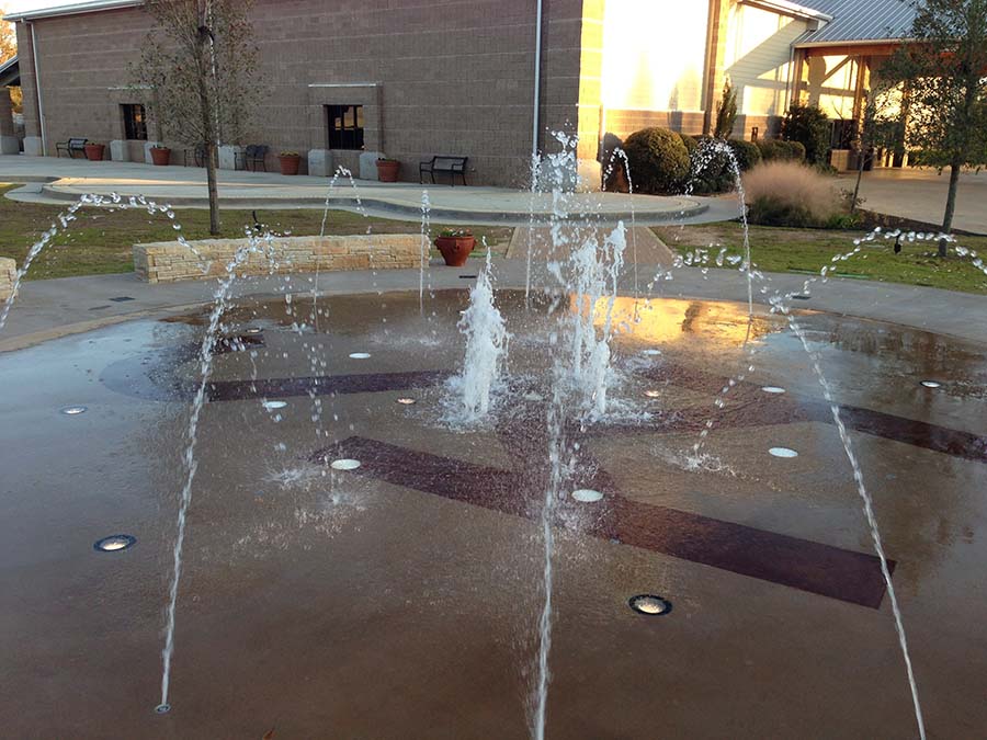 splash fountain with spraying water jets